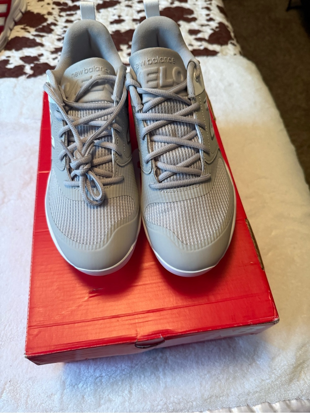 New in the Box-  New Balance Velo steel cleats.   Light Gray.   Never worn